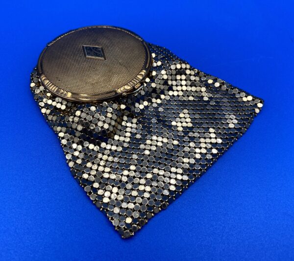 Vintage goldtone mesh compact with attached bag