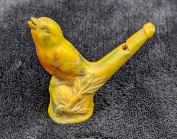 Vintage Irwin Yellow & Red Marbled Celluloid Singing Bird Water Whistle