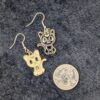 K for S-----Vintage Enamel Cat Earrings | Black & White Moon Kitty Charms | Whimsical Mismatched Pair | Playful Retro Cat Lover Jewelry - Image 2