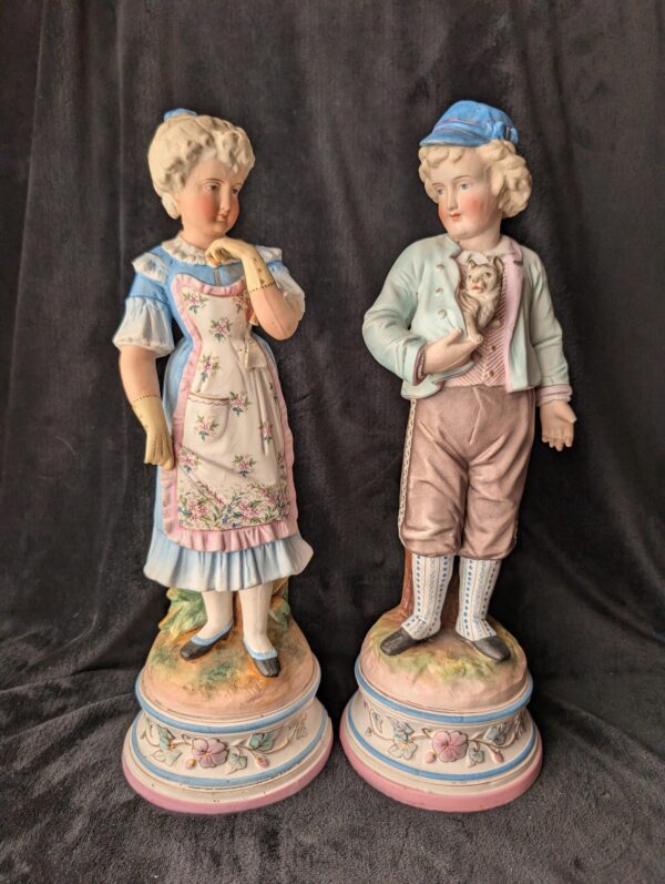 Antique French Bisque Porcelain Boy and Girl Statues | 19th-Century Pair
