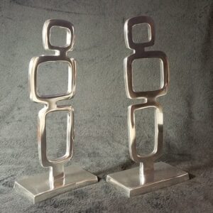 Beautiful pair of mid-century modern abstract geometric chrome/stainless steel sculptures -- vintage beauties!