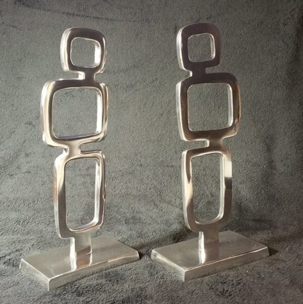 Beautiful pair of mid-century modern abstract geometric chrome/stainless steel sculptures -- vintage beauties!